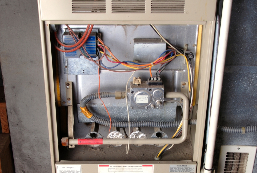 Furnace with a malfunctioning ignition light, indicating potential heating system issues. Professional furnace inspection and repair services available. Contact us for heater and furnace services in Coeur d'Alene (CDA), Post Falls and Hayden, ID. Trust J.A. Bertsch Heating and Cooling for furnace repair. Professional electrician and HVAC technician near me. Contact us to schedule an appointment for heat pump, heater, or furnace repair near me in Coeur d'Alene, CDA, Post Falls, Hayden, Rathdrum, Sandpoint, Spirit Lake, St Maries, Athol, Blanchard, Dalton Gardens, Worley, Plummer, or Harrison, ID. Expert assistance for furnace repair, tune up, maintenance, replacement and installation. Contact J.A. Bertsch Heating and Cooling today for an HVAC company you can trust!